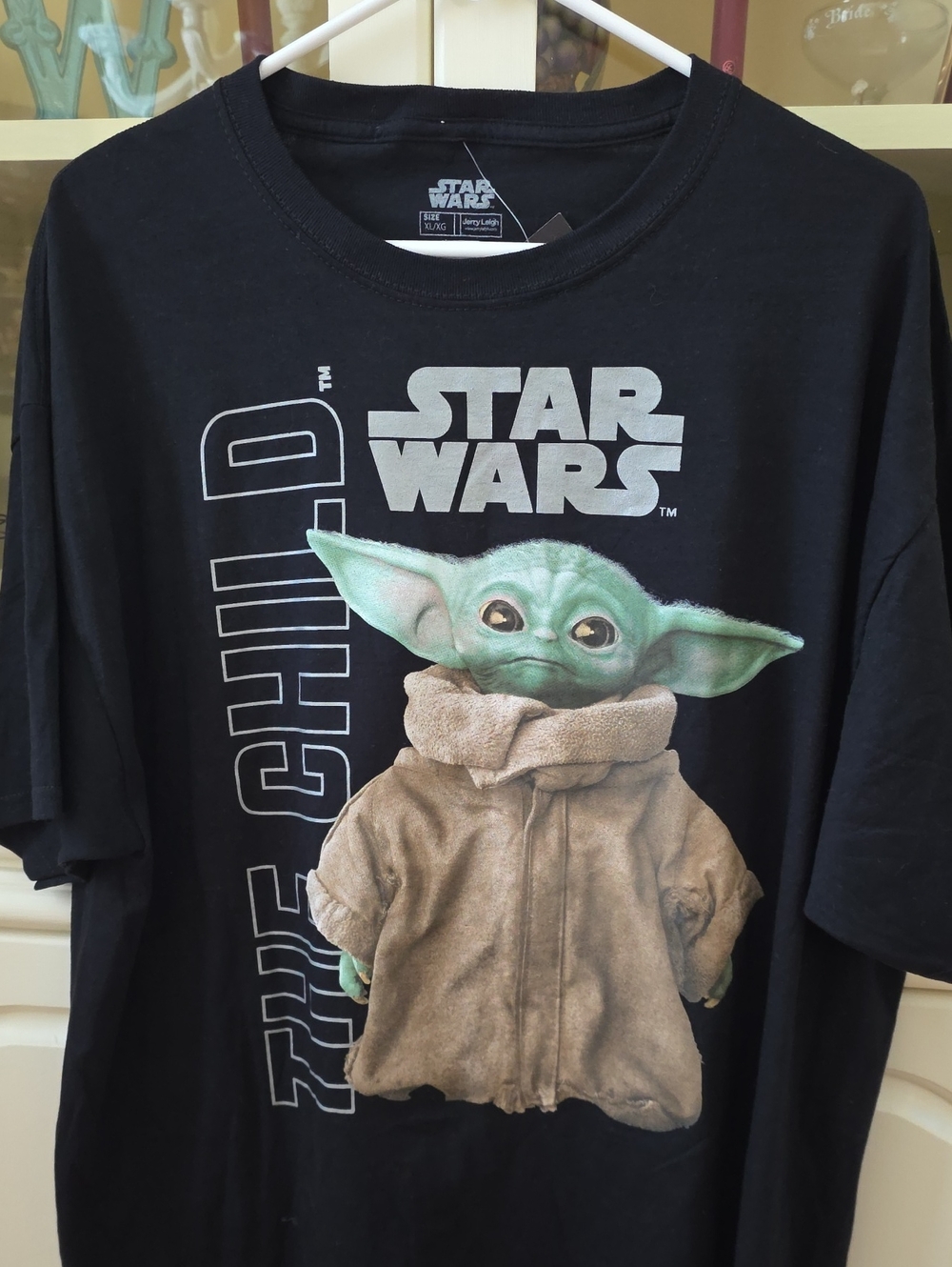 Star Wars Black Tee Featuring The Child with Green and Tan Artwork